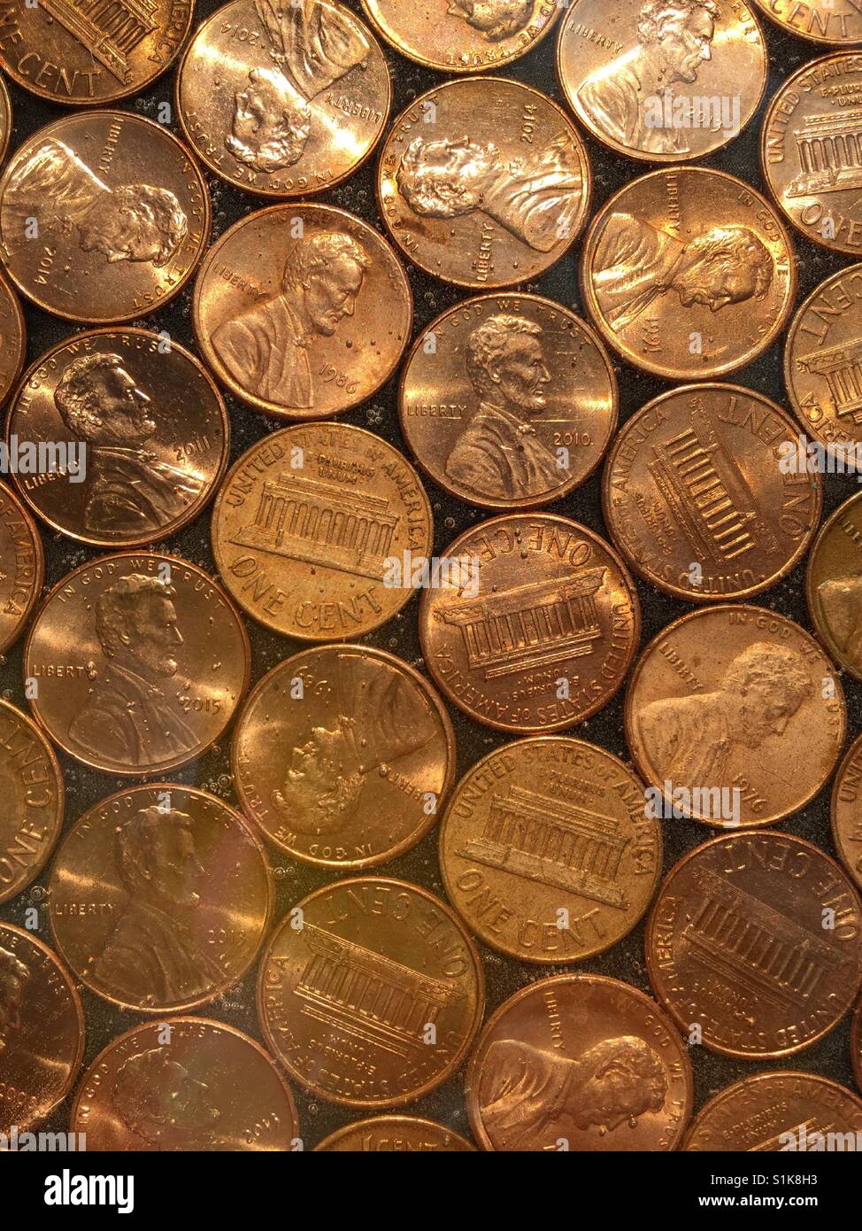 Close-up of shiny copper pennies, USA - Smartphone Captured Stock Image