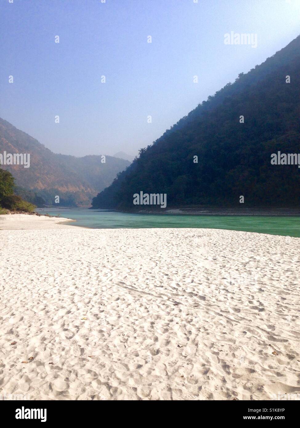 White sand beach on the holy Ganga river in Rishikesh, India Stock Photo