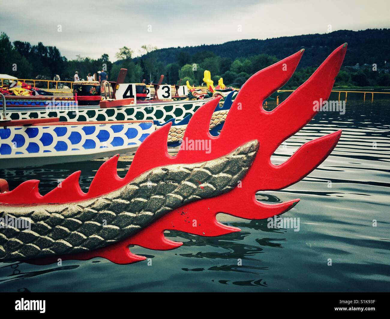 Carved red dragon tail of the race boat Stock Photo