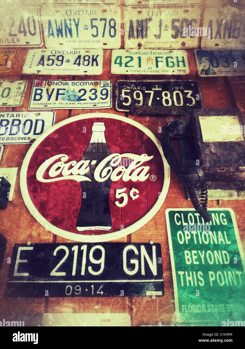 Old license plates as wall art. - Smartphone Captured Stock Image
