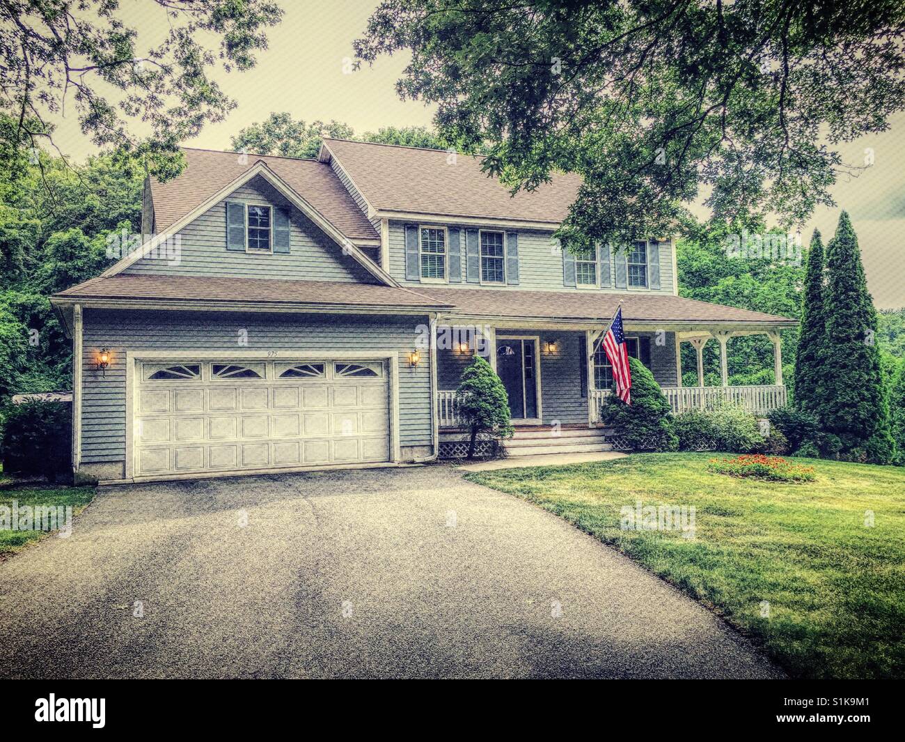 Upscale and well-kept residential home in the suburbs, USA - Smartphone Captured Stock Image