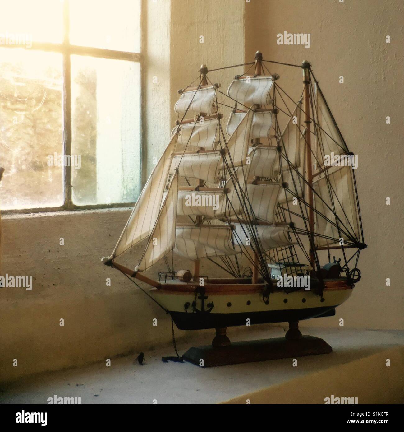 Model ship in window of building - Smartphone Captured Stock Image