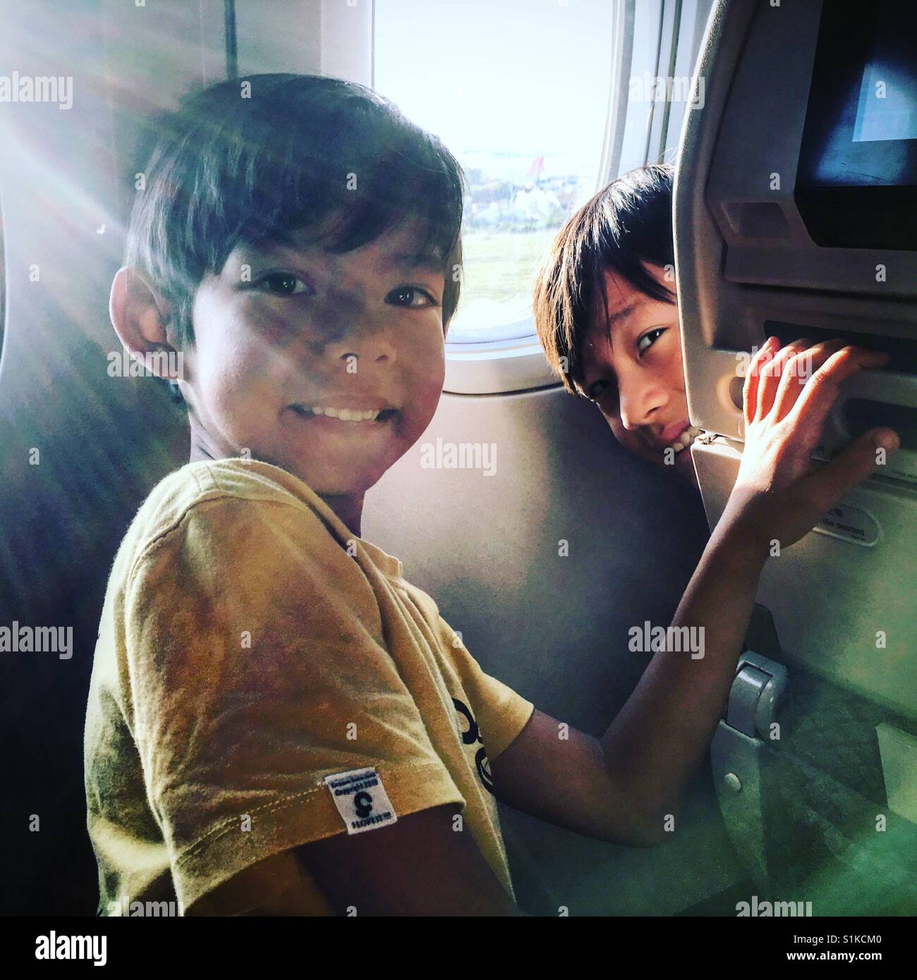 Happy plane seat hi-res stock photography and images - Alamy