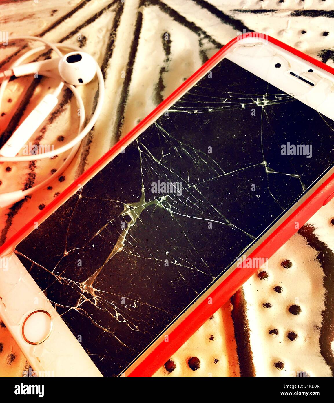 iPhone with a cracked screen - Smartphone Captured Stock Image