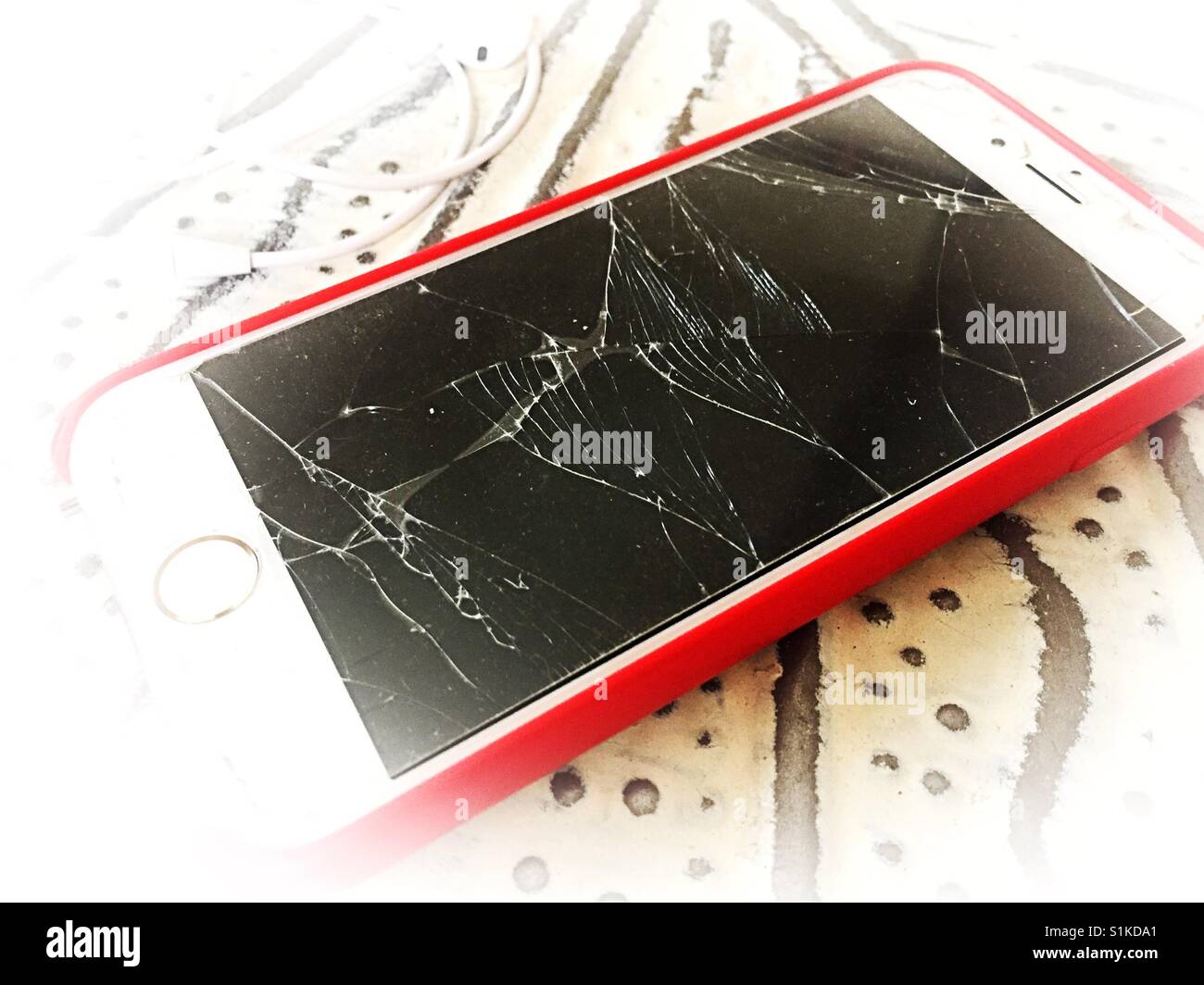 iPhone with the cracked screen - Smartphone Captured Stock Image