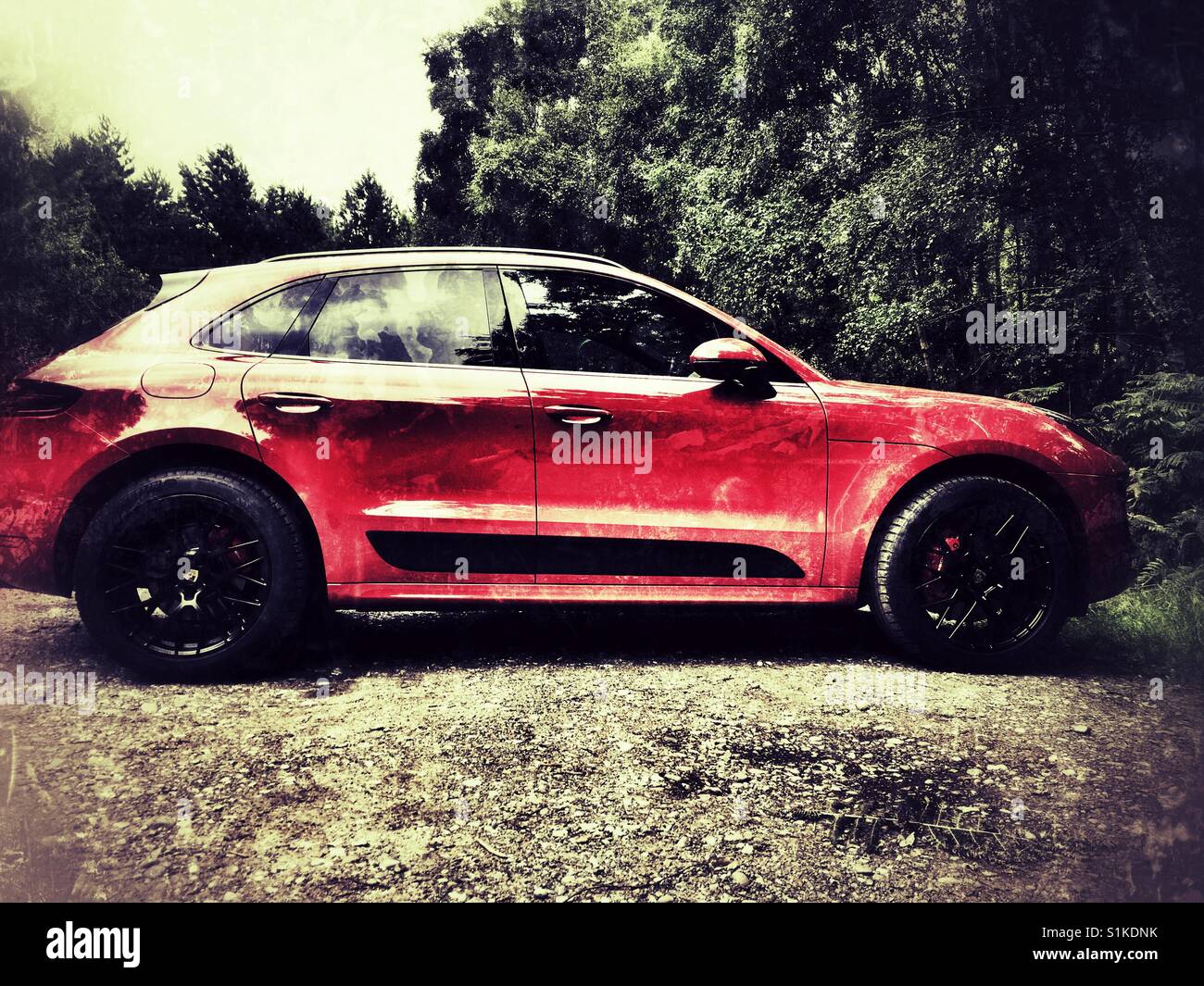 Porsche Macans 4x4 SUV - Smartphone Captured Stock Image