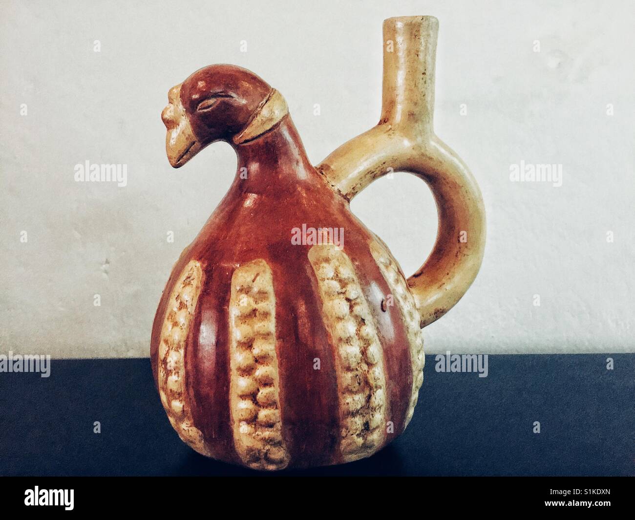 Traditional Peruvian ceramic stirrup jug in shape of a bird - Smartphone Captured Stock Image