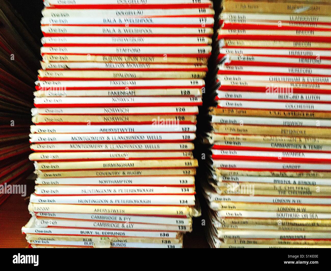 Closeup of stack of old Ordnance Survey maps of UK destinations Stock ...