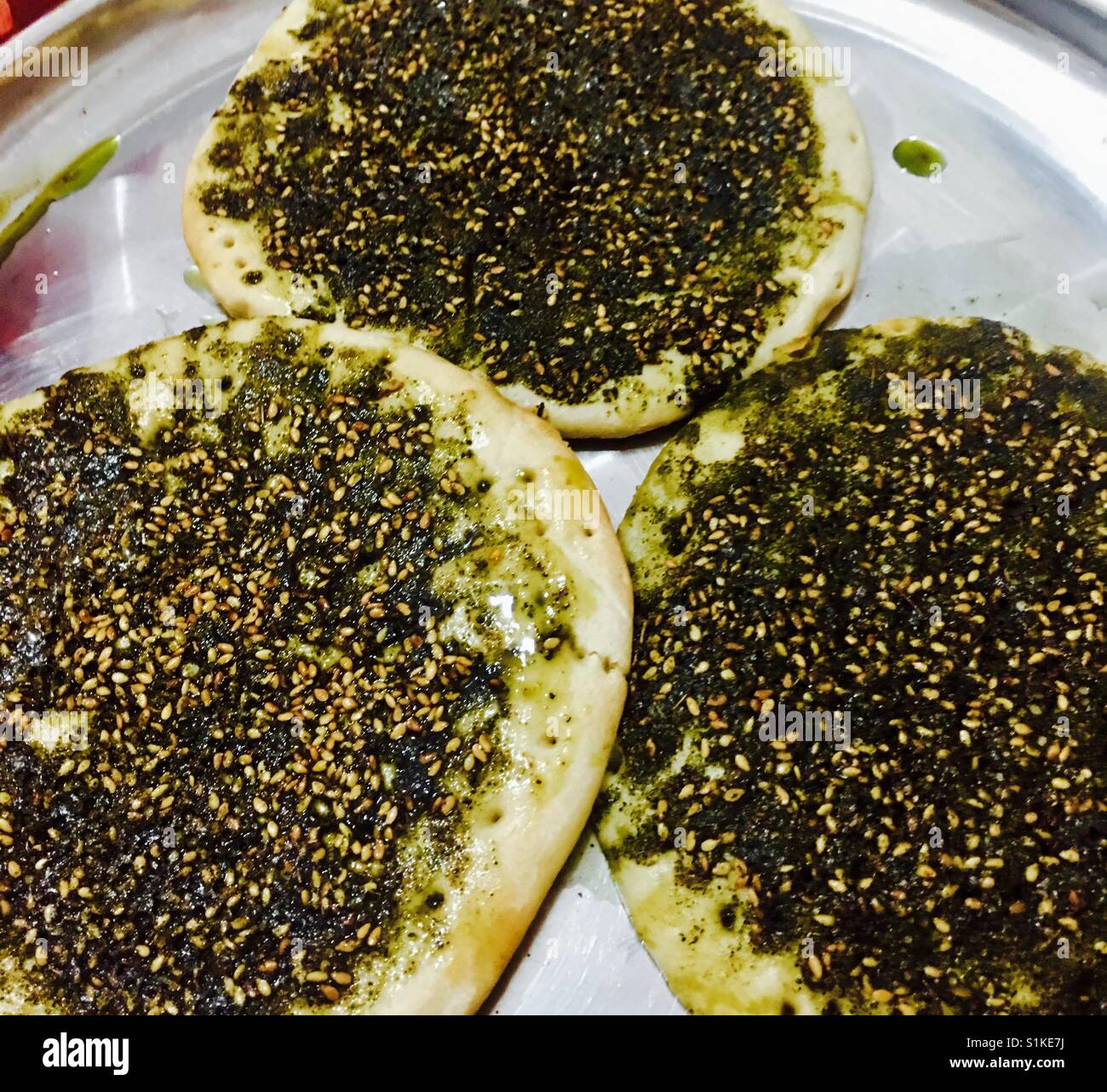 Traditional Arab bread from the Galilie. Bread is baked with Zaa'atar spice. - Smartphone Captured Stock Image
