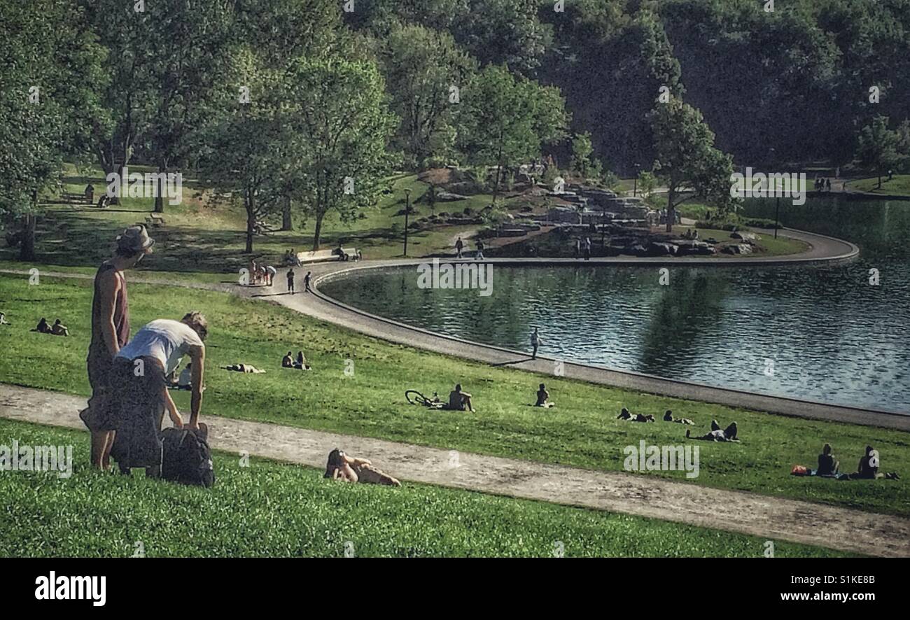 People relaxing at Beaver Lake, Mount Royal, Montreal, Quebec Stock