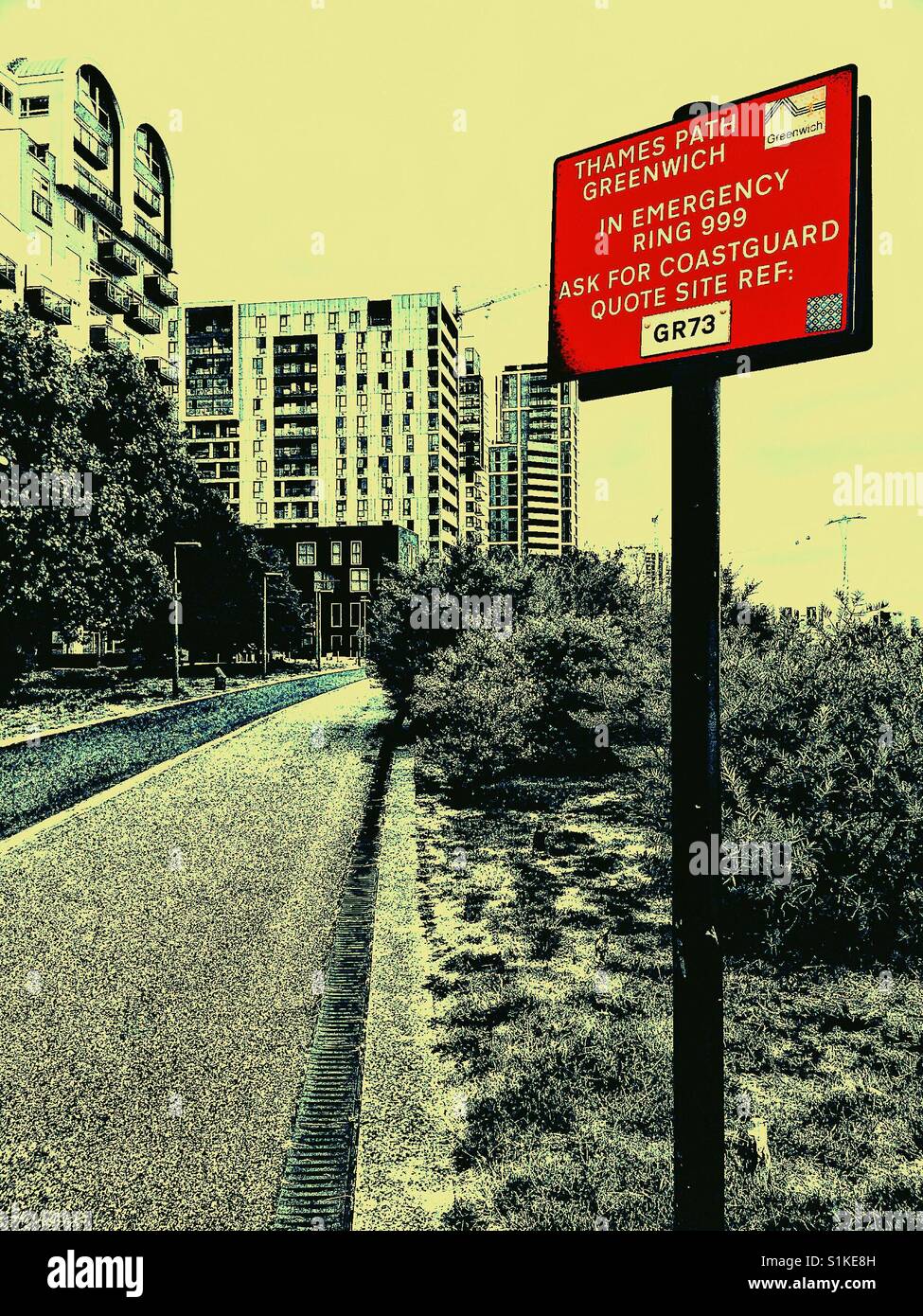 Red emergency information sign on Thames Path, Greenwich Pei sula, London, England - Smartphone Captured Stock Image