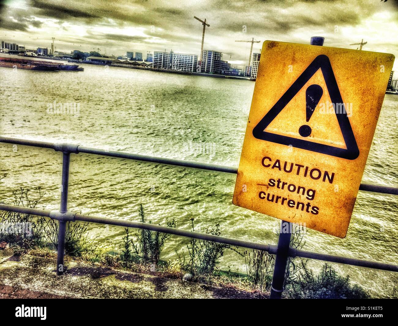 Strong currents sign by river Thames, London, England - Smartphone Captured Stock Image