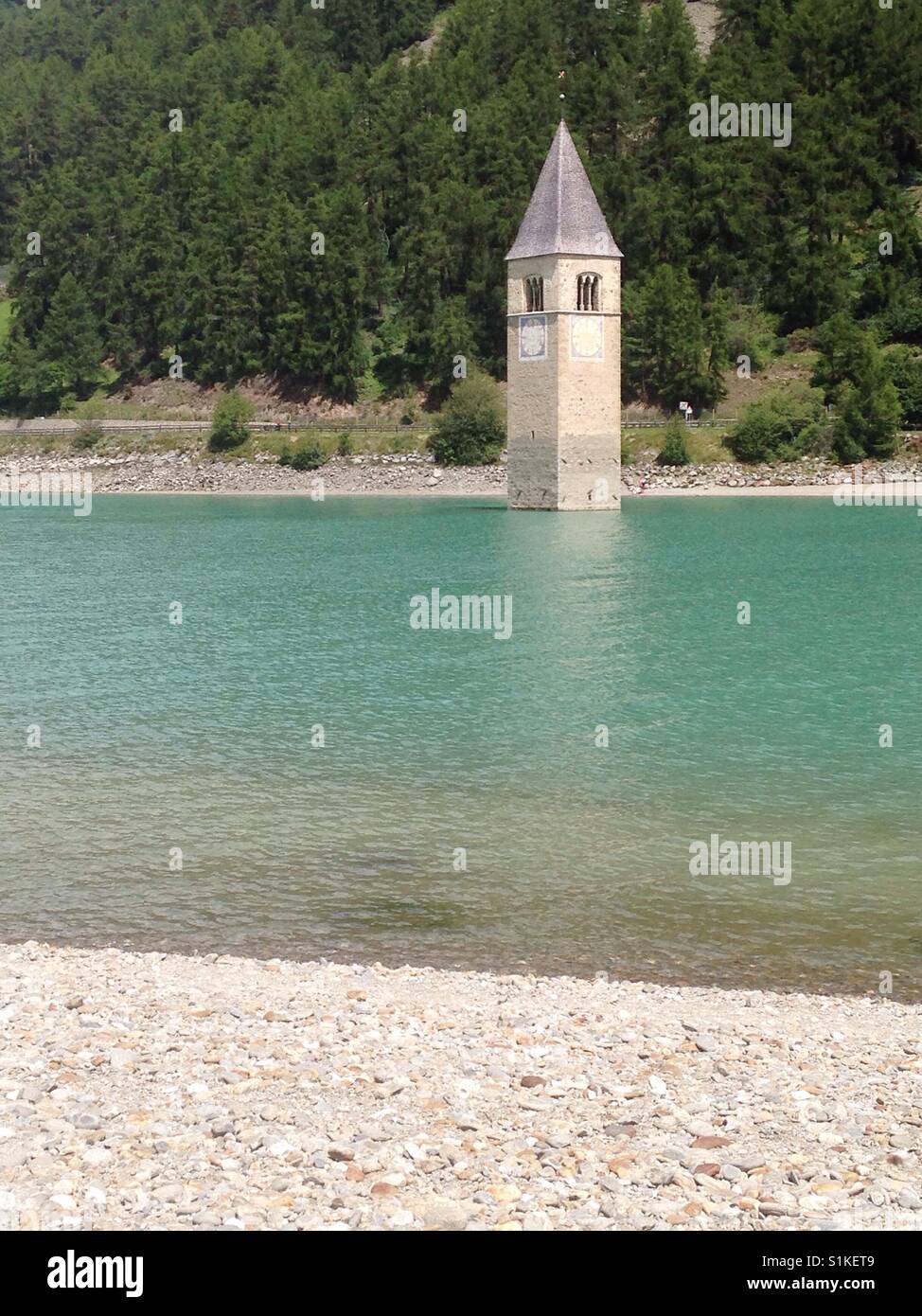 Bell tower in the Lake Resia - Lago di Resia - Reschensee, South Tyrol, Italy - Smartphone Captured Stock Image