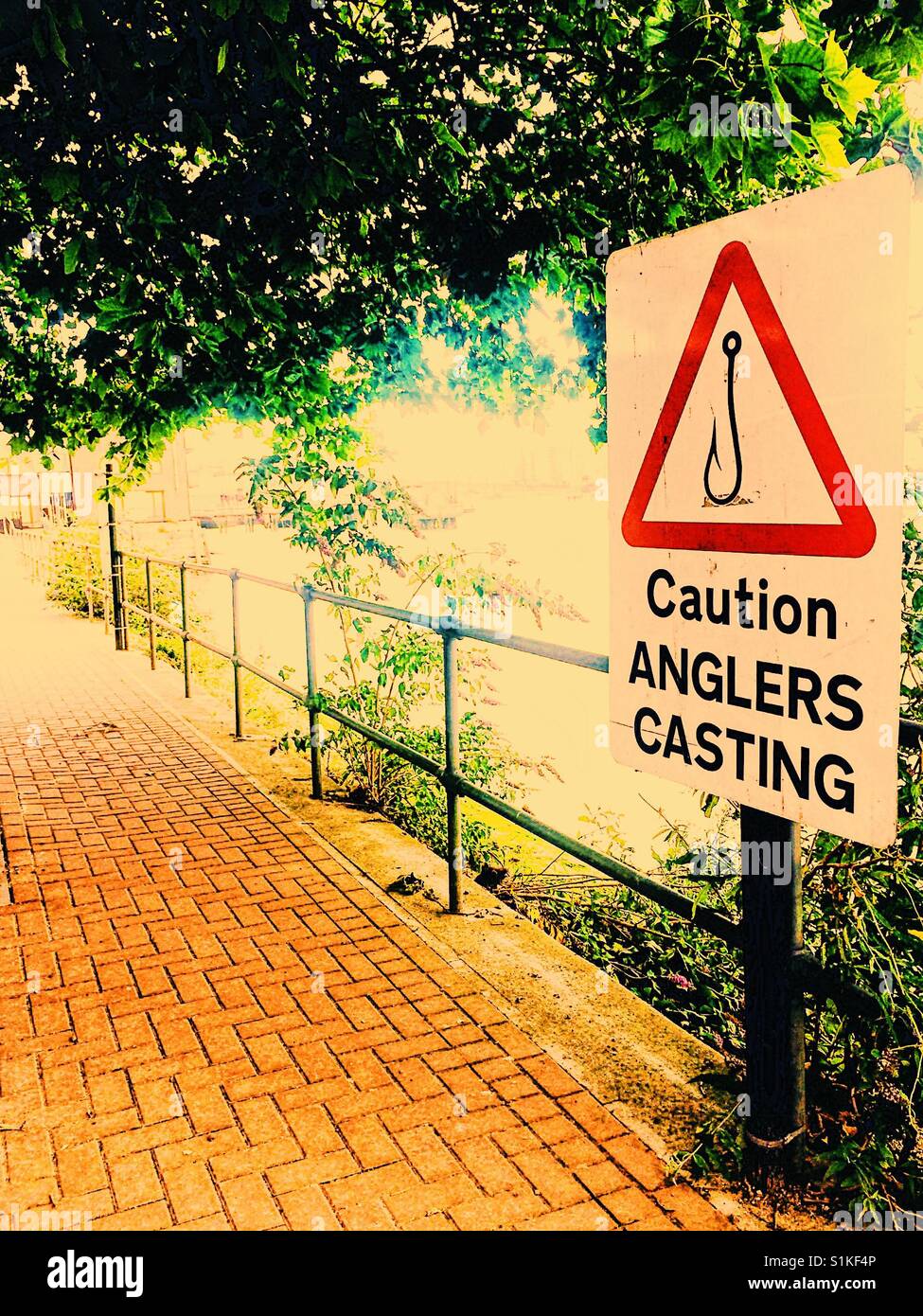 Caution anglers casting warning sign, London, England - Smartphone Captured Stock Image
