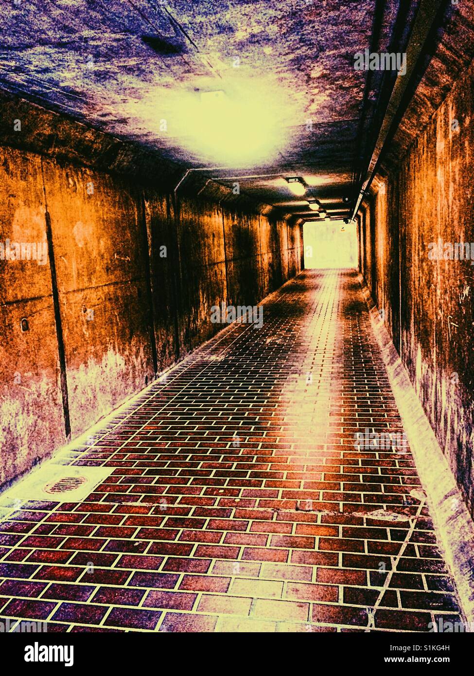 Passageway walkway on Thames path leading to Thames Barrier, London, England - Smartphone Captured Stock Image