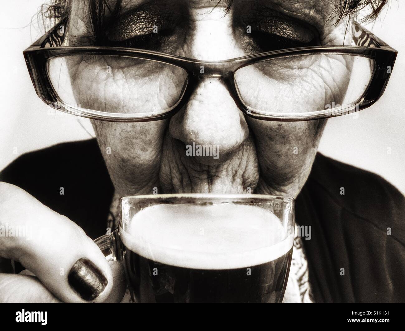 Woman drinking espresso coffee - Smartphone Captured Stock Image