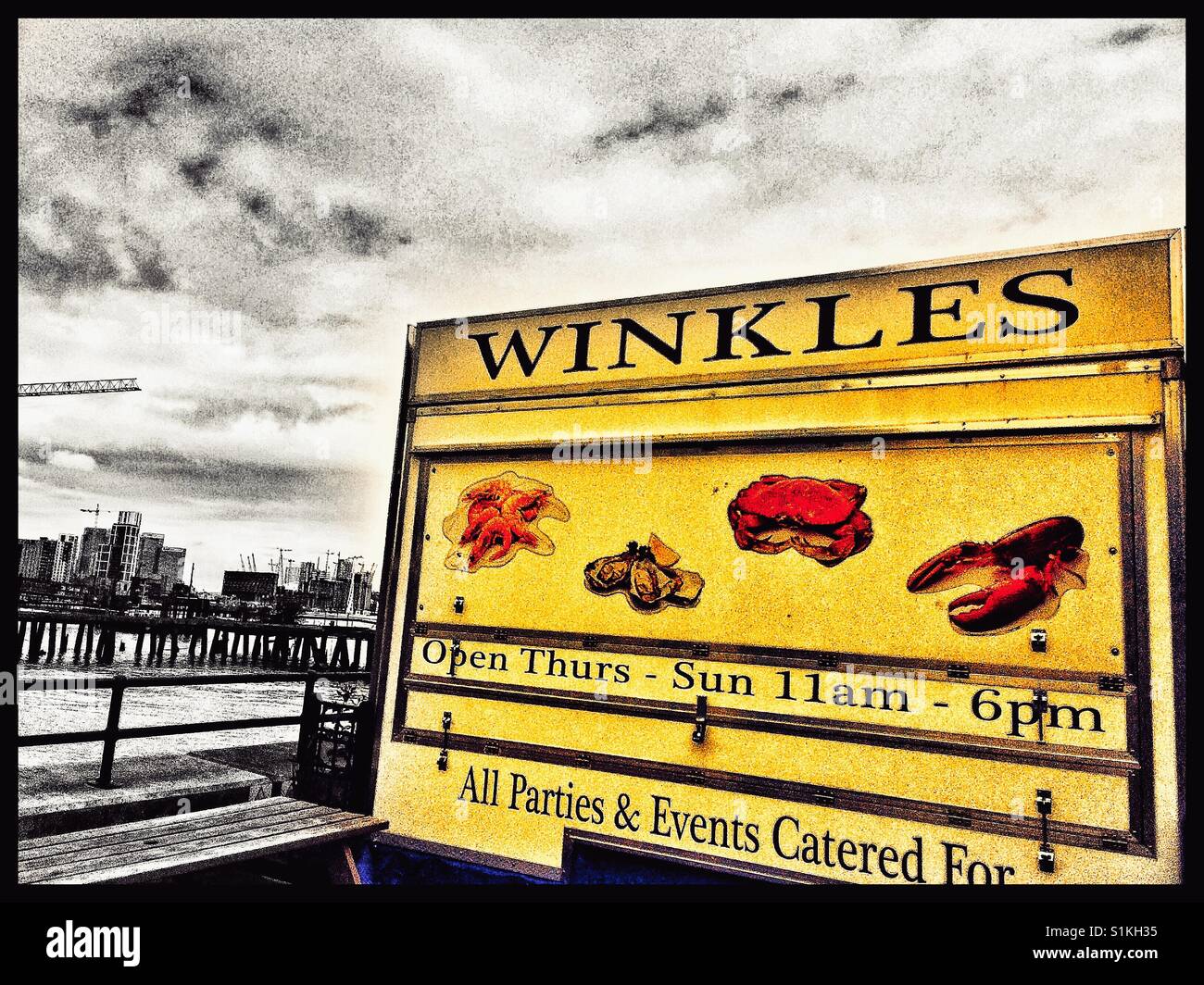 Shellfish kiosk by river Thames  selling winkles, lobster, crab, mussels, London, England - Smartphone Captured Stock Image