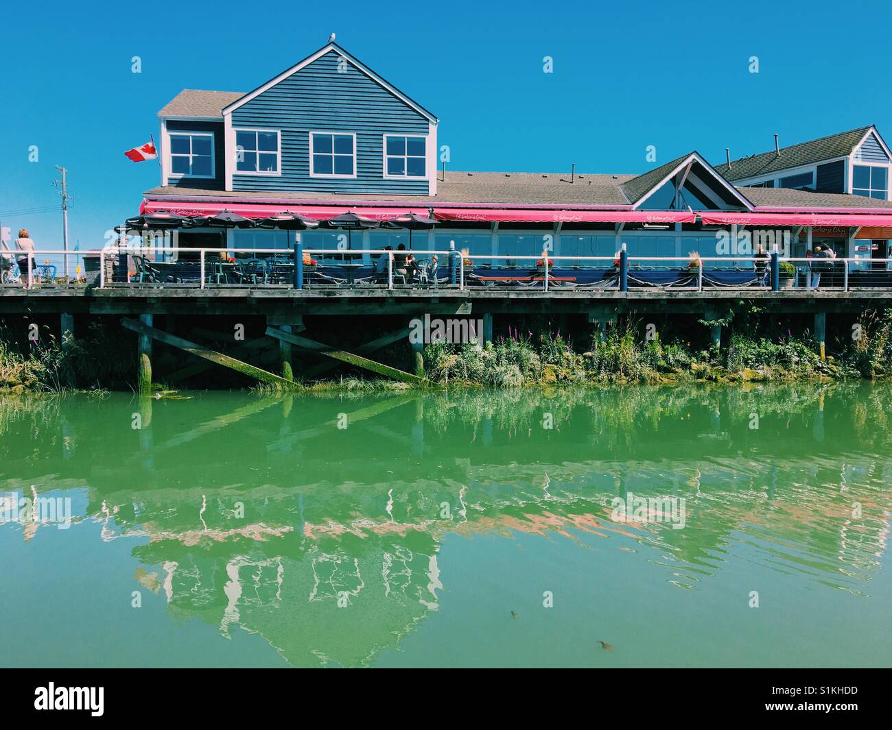 Hot sunny summer day in Steveston Village in British Columbia, Canada. July 2017. - Smartphone Captured Stock Image