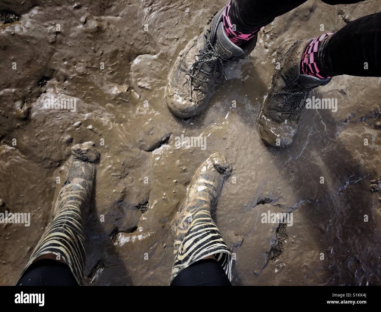 Muddy welly boots - muddy festival or camping - Smartphone Captured Stock Image