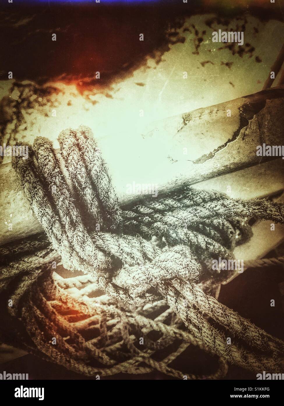 Ropes tied to ships rail at sea - Smartphone Captured Stock Image