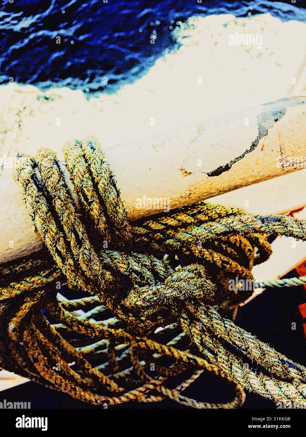 Ropes tied to ships rail at sea - Smartphone Captured Stock Image