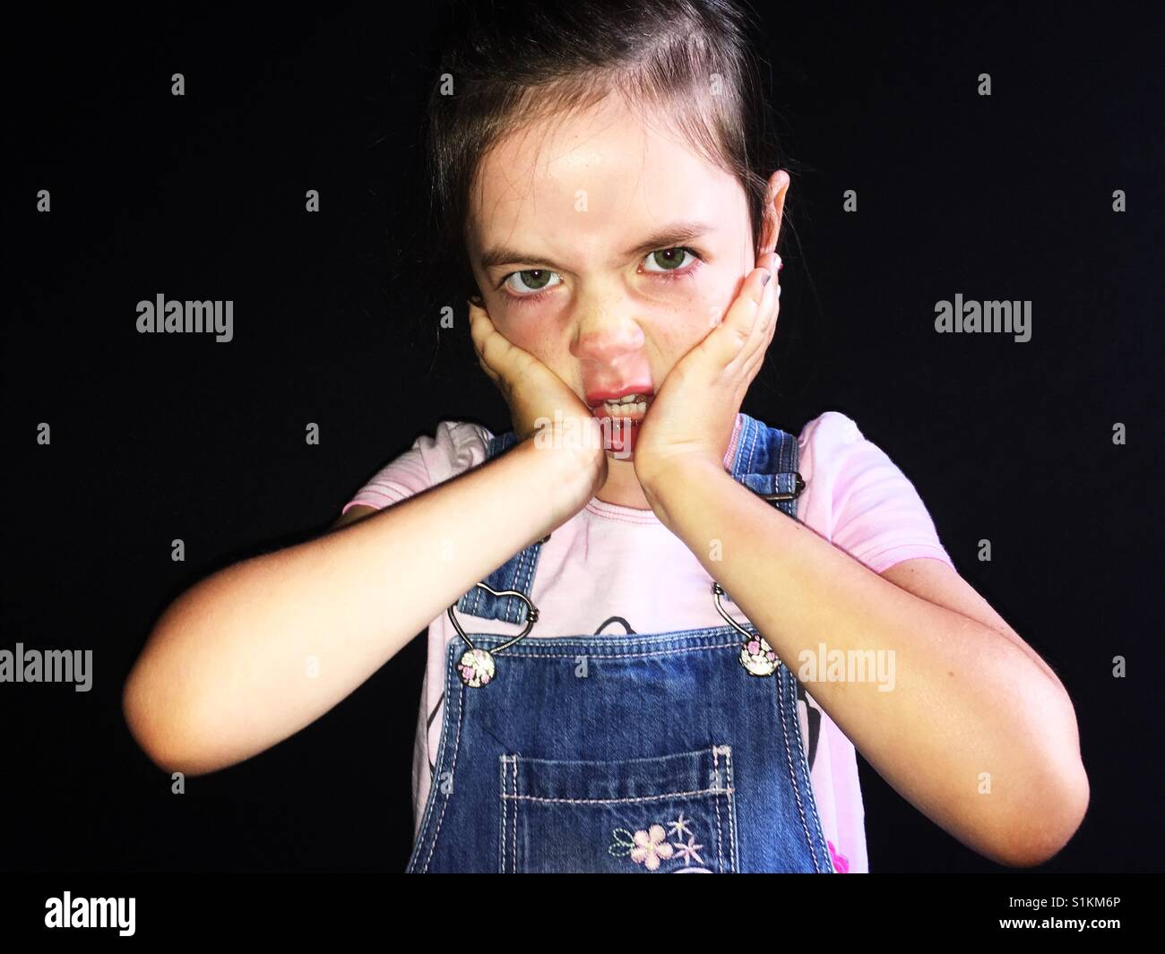 Girl pulling an angry face - Smartphone Captured Stock Image