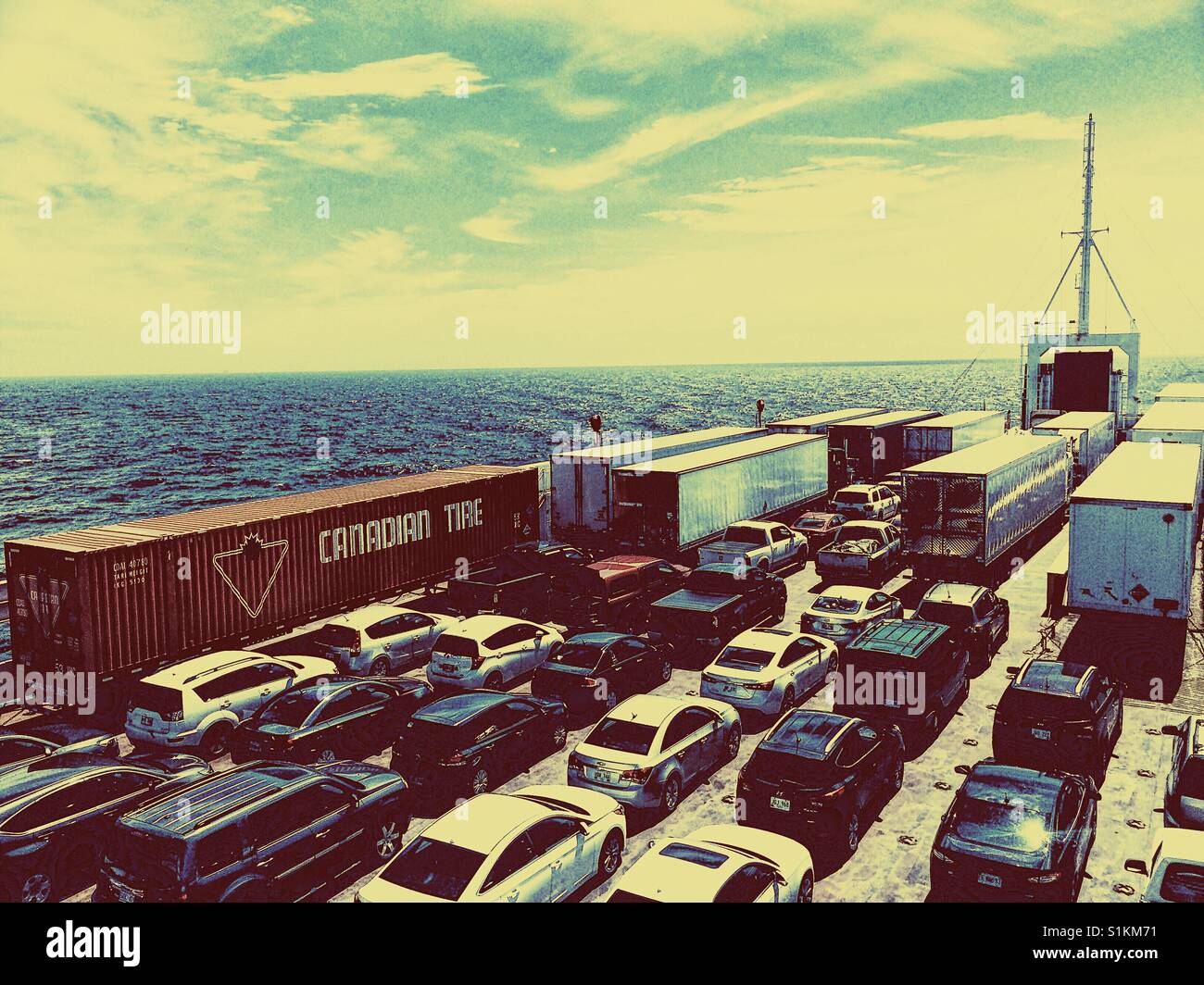 Cars and lorries on outside deck of ferry from Nova Scotia to