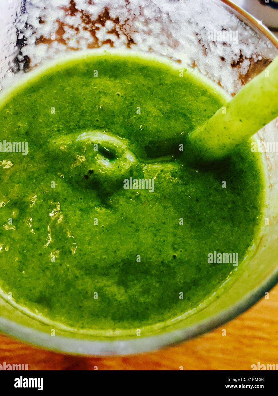 Green smoothie with avocado and lime - Smartphone Captured Stock Image