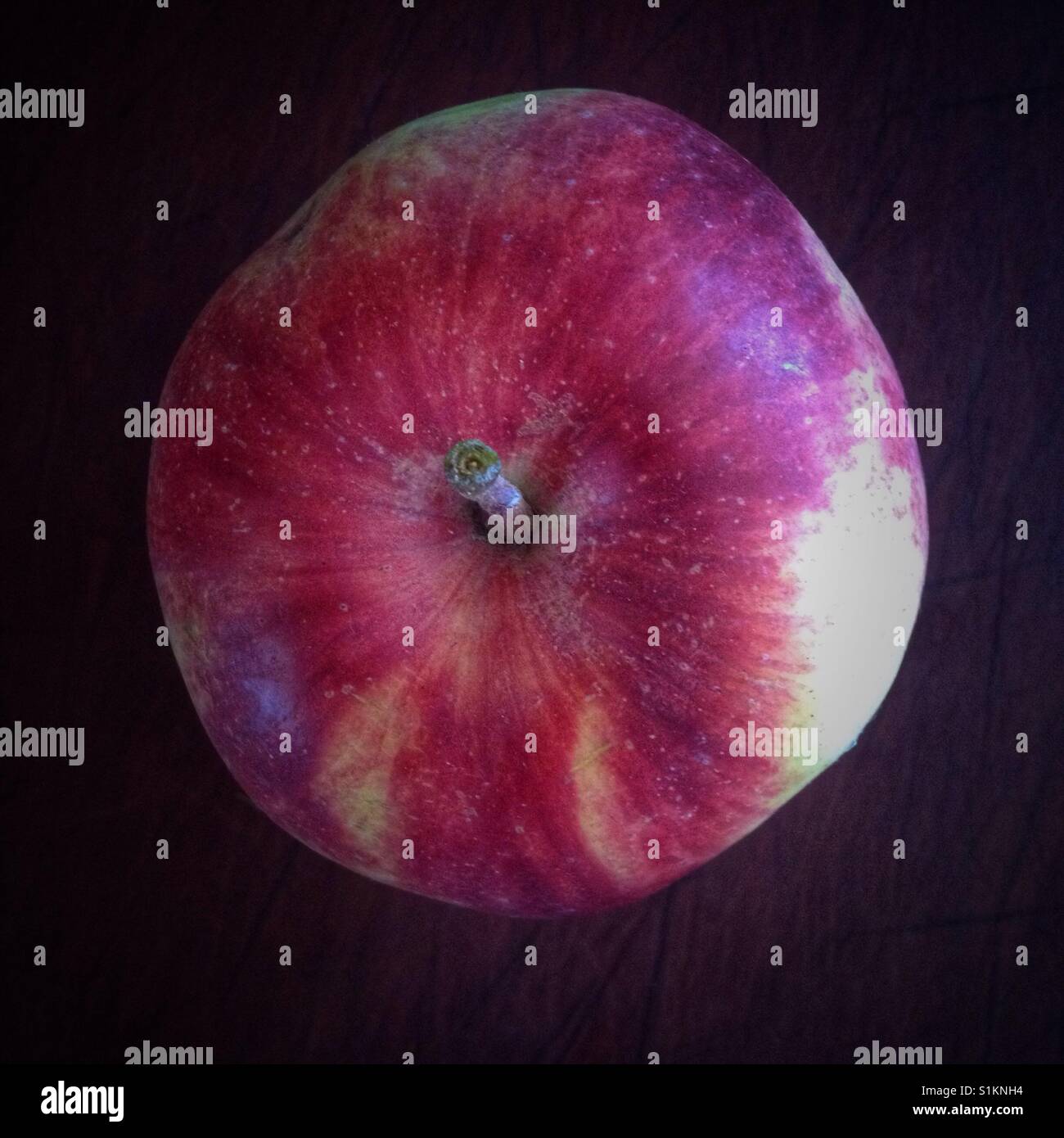 Apple on cutting board - Smartphone Captured Stock Image