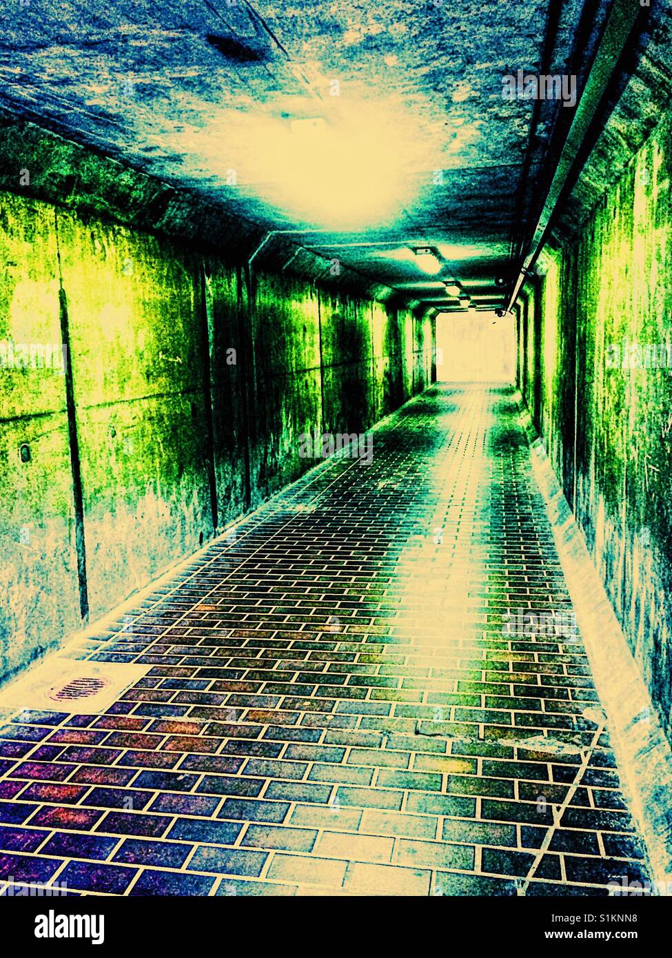 Passageway walkway on Thames path leading to Thames Barrier, London, England - Smartphone Captured Stock Image