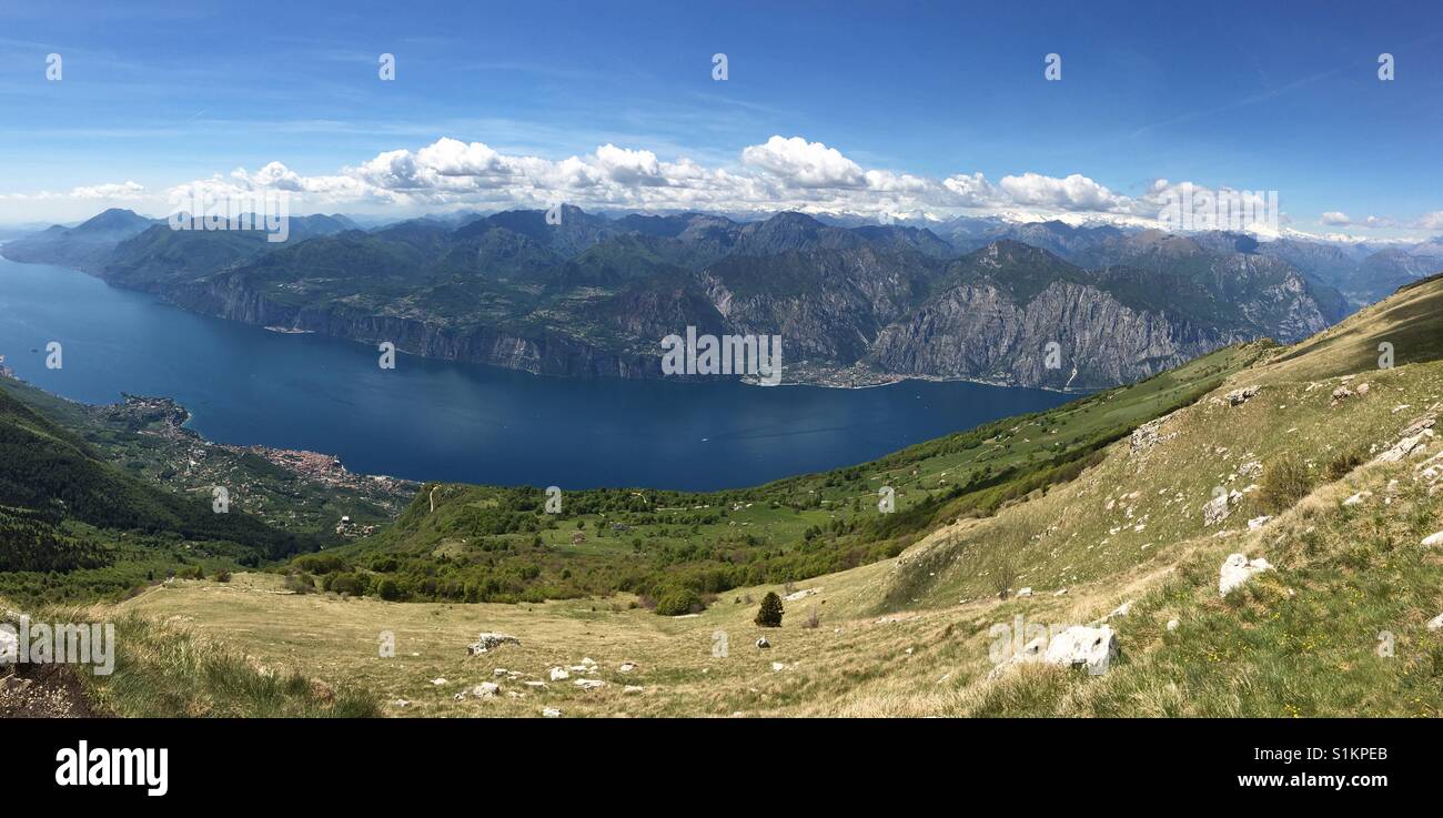 Lake Garda, Italy - May 2017: Panoramic view from Monte Baldo looking down to Malcesine - Smartphone Captured Stock Image