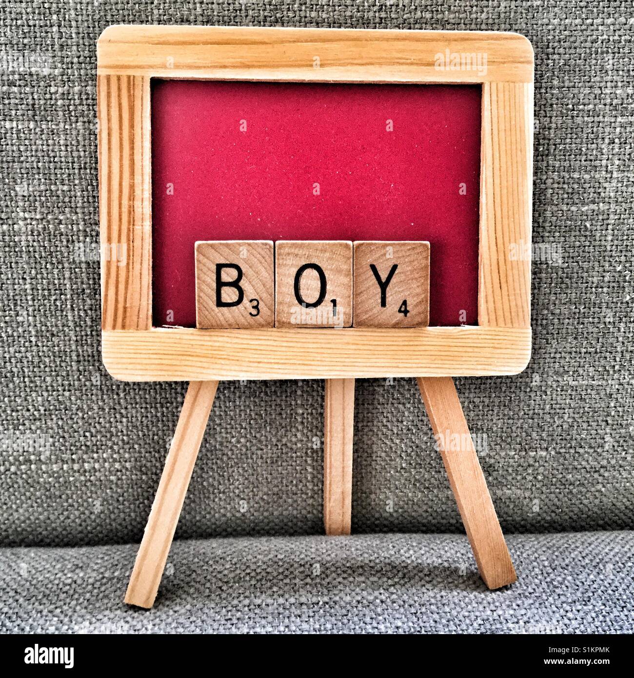 Miniature chalkboard spelling Boy. - Smartphone Captured Stock Image