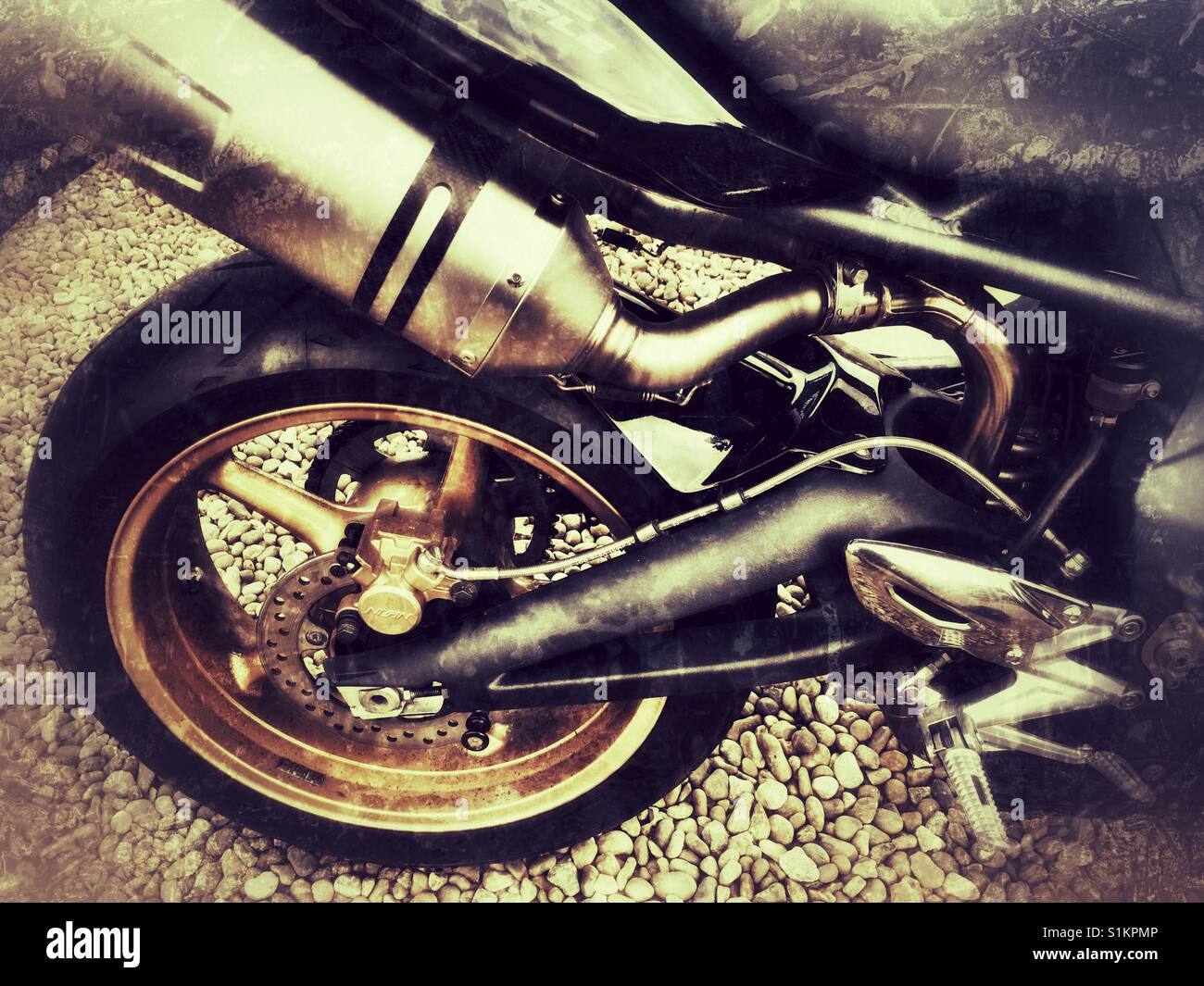 Exhaust system on Triumph motorcycle - Smartphone Captured Stock Image