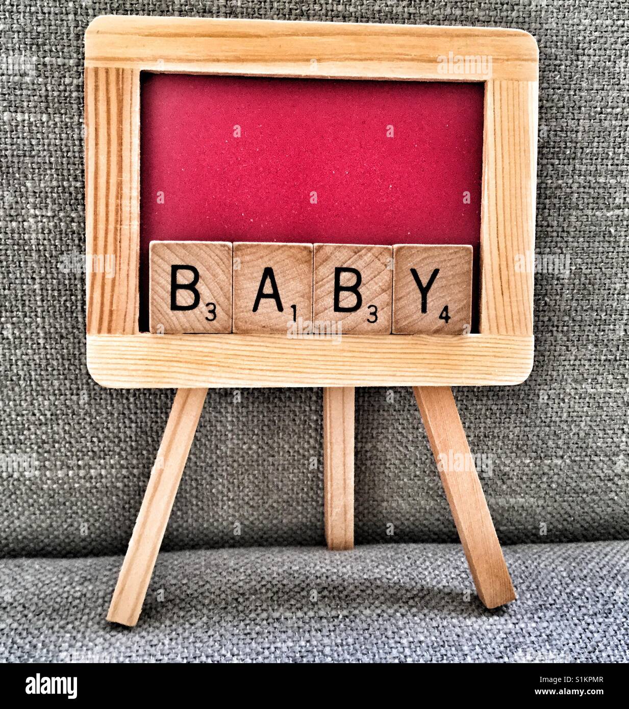 Miniature chalkboard spelling Baby Stock Photo Alamy