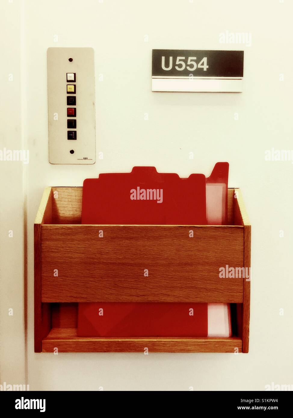 Doctor's patient charts outside examination room - Smartphone Captured Stock Image