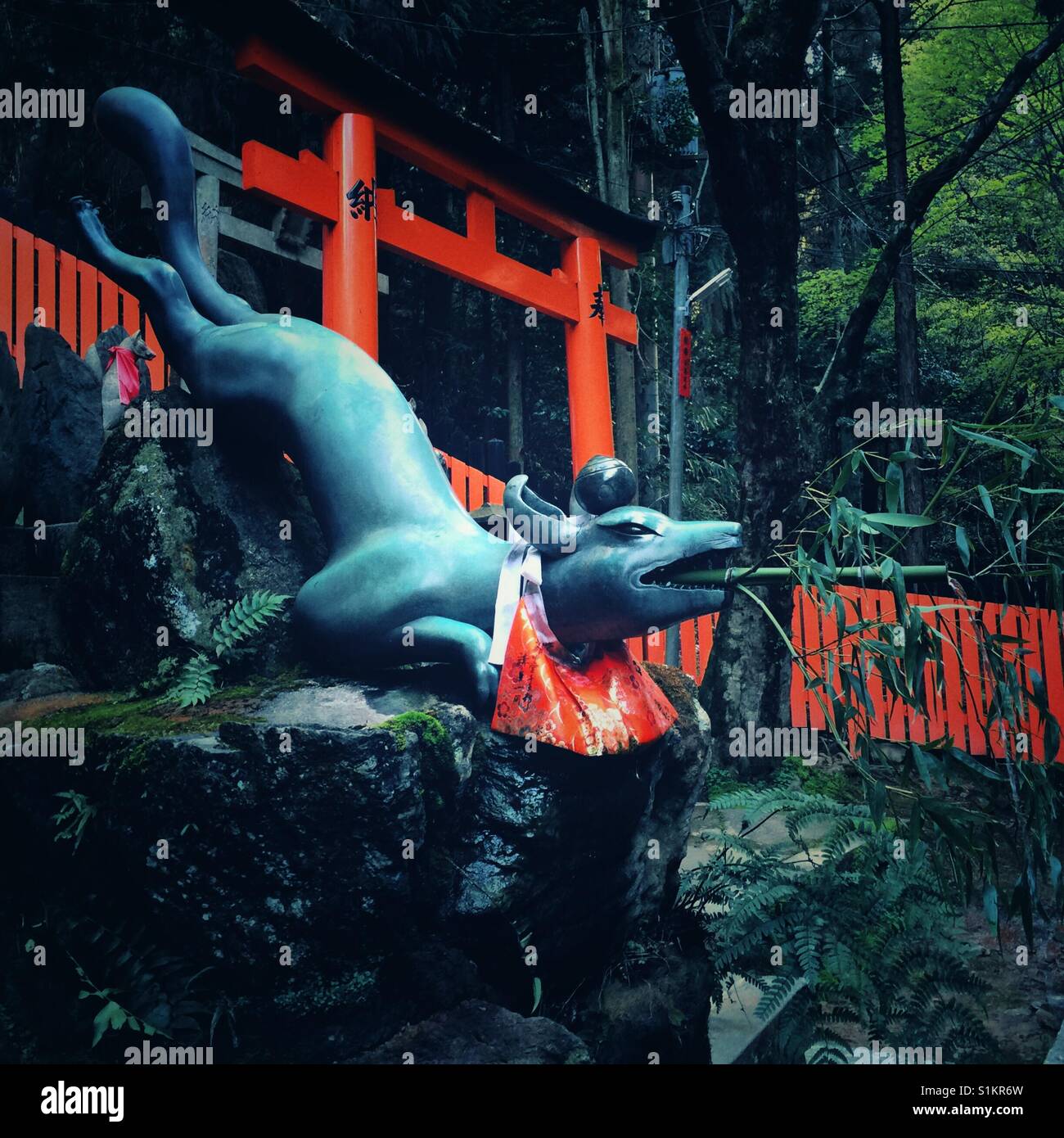 Stone fox fountain at Fushimi Inari in Kyoto - Smartphone Captured Stock Image