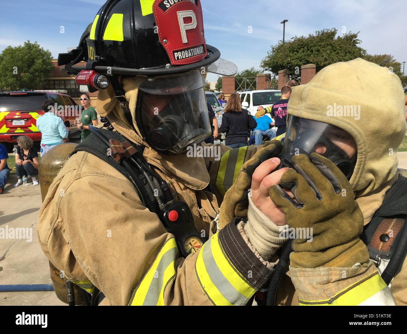 Firemen Suiting Up Stock Photo