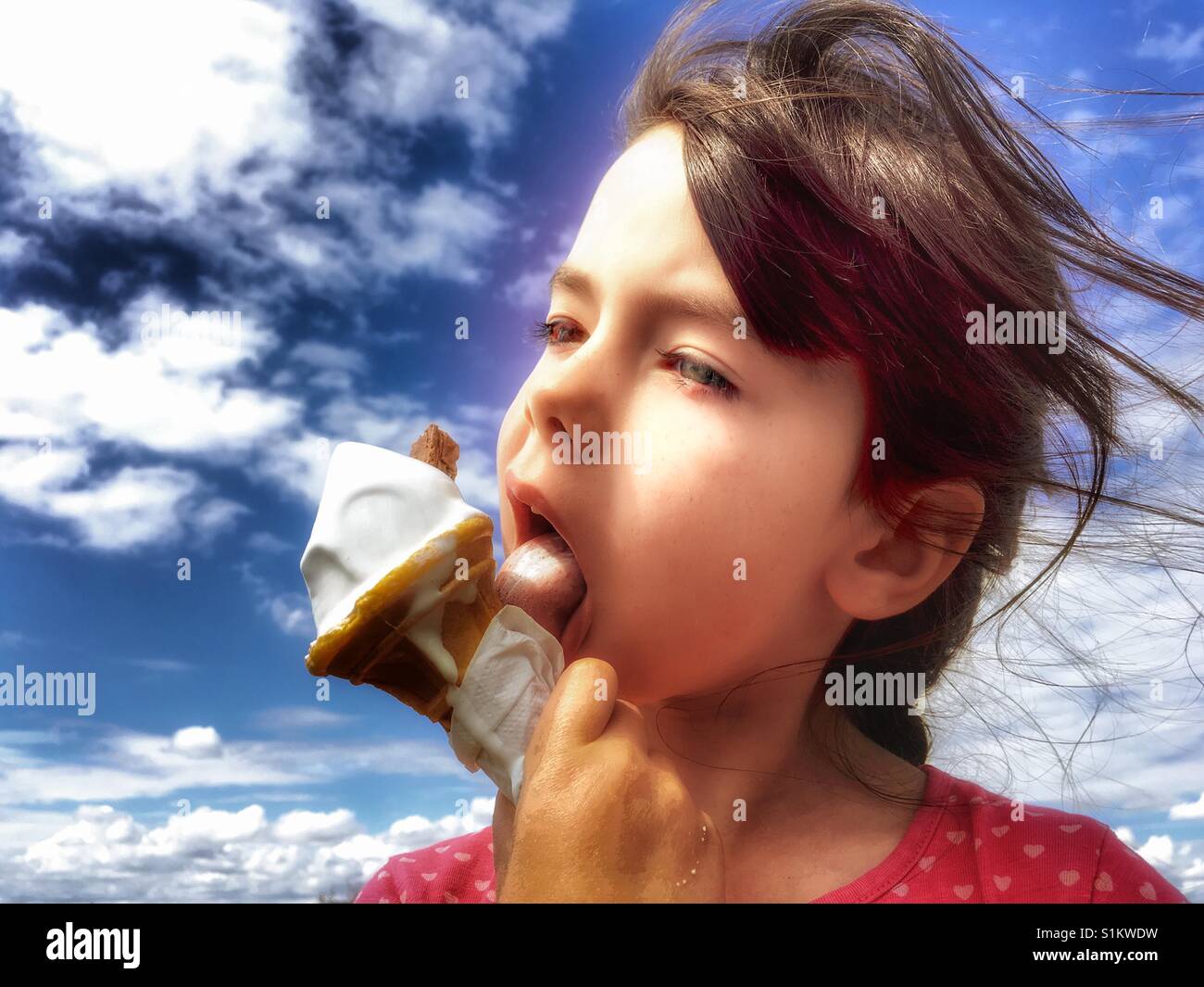 Girl eating ice cream - Smartphone Captured Stock Image