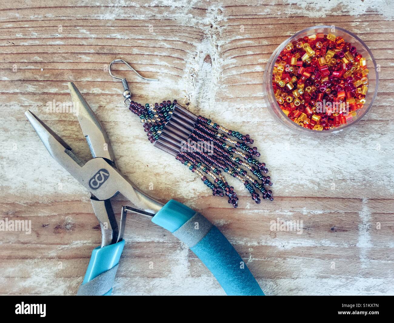 Making beaded earrings - Smartphone Captured Stock Image