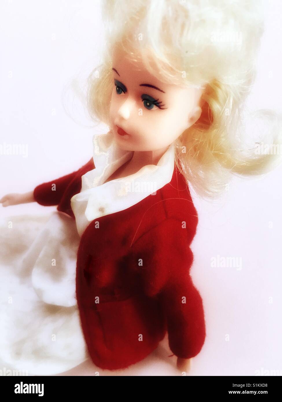 Blonde haired doll from 1970's (Butlins holiday red coat) Stock Photo