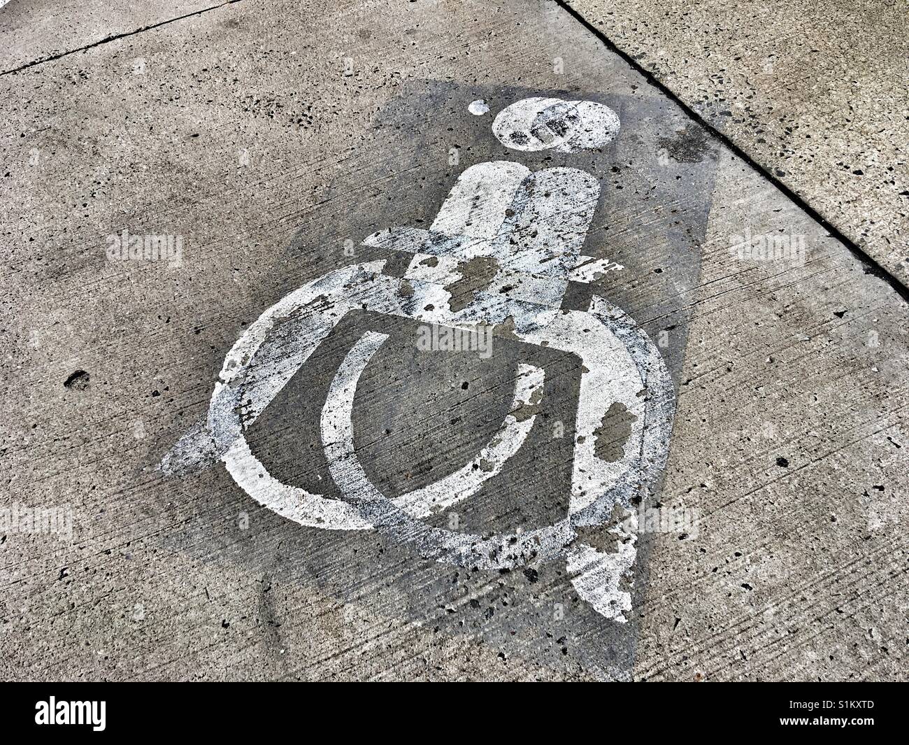 A strange disabled parking sign Stock Photo