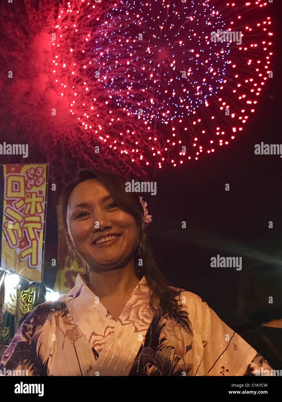 Japanese lady at firework party Stock Photo