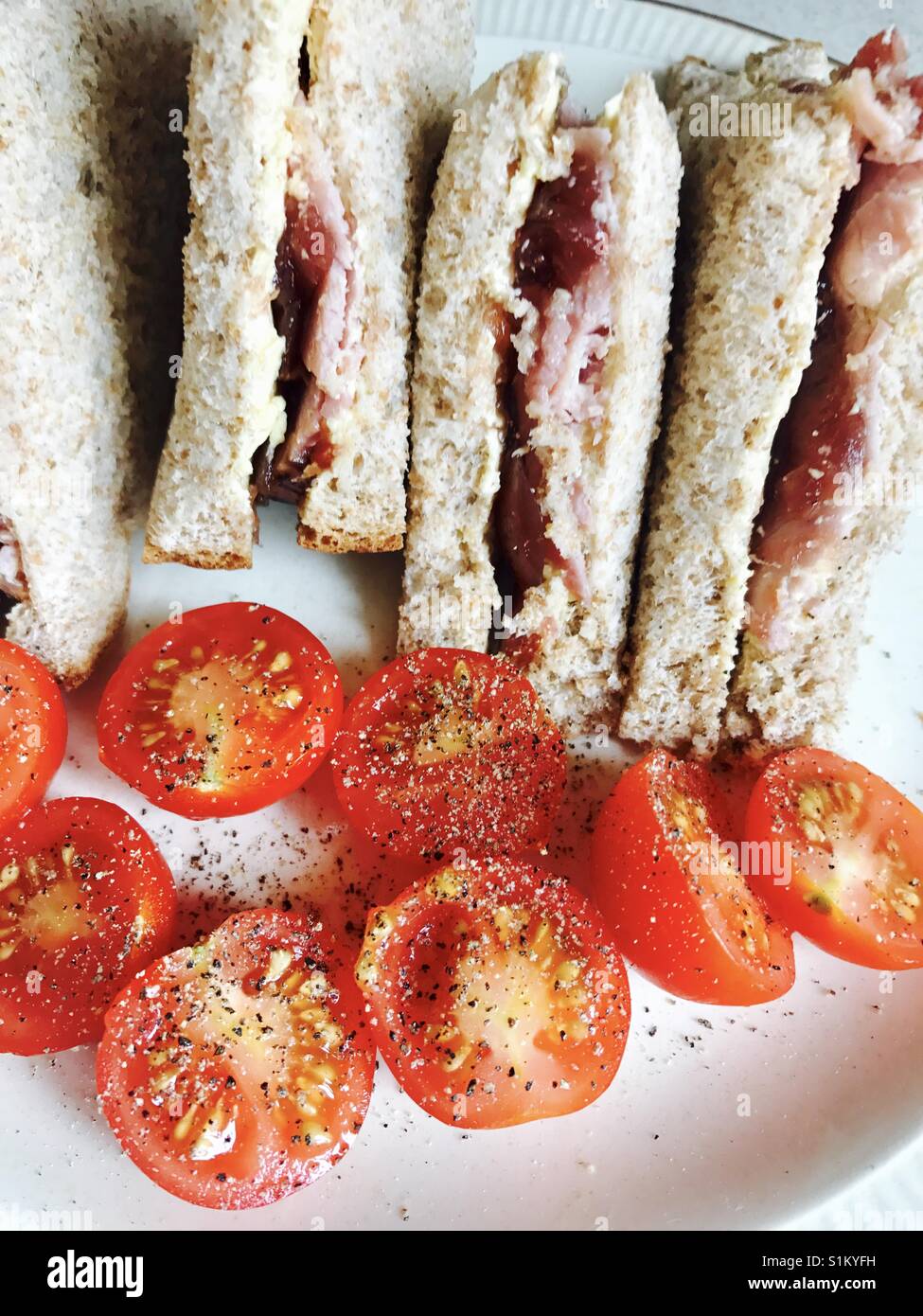 Ham and chutney brown bread sandwiches with tomatoes Stock Photo Alamy