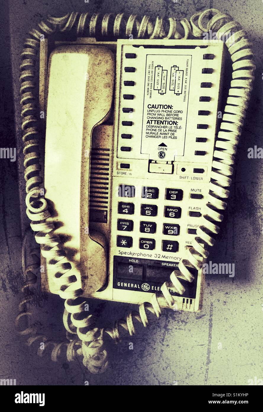 Old wall touch tone telephone. Stock Photo