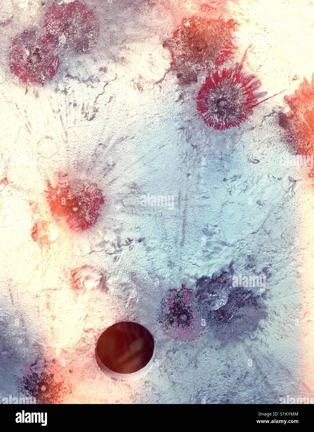 Close up of steel plate target with paint splatters and bullet dents - Smartphone Captured Stock Image