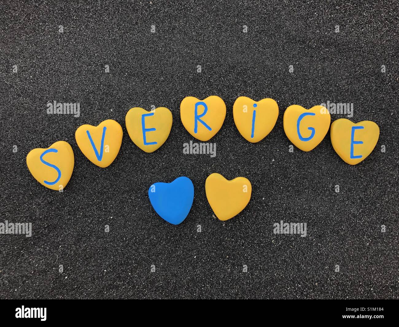 Sverige, Sweden, country name with national colors and heart stones letters - Smartphone Captured Stock Image