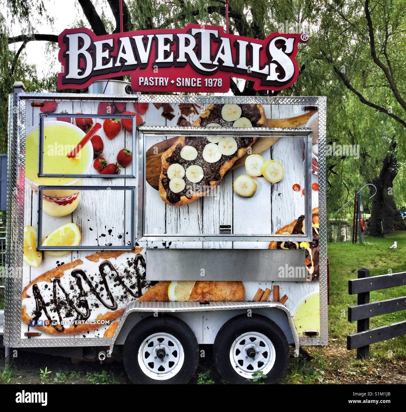 Dessert truck selling ice cream and pastries. - Smartphone Captured Stock Image