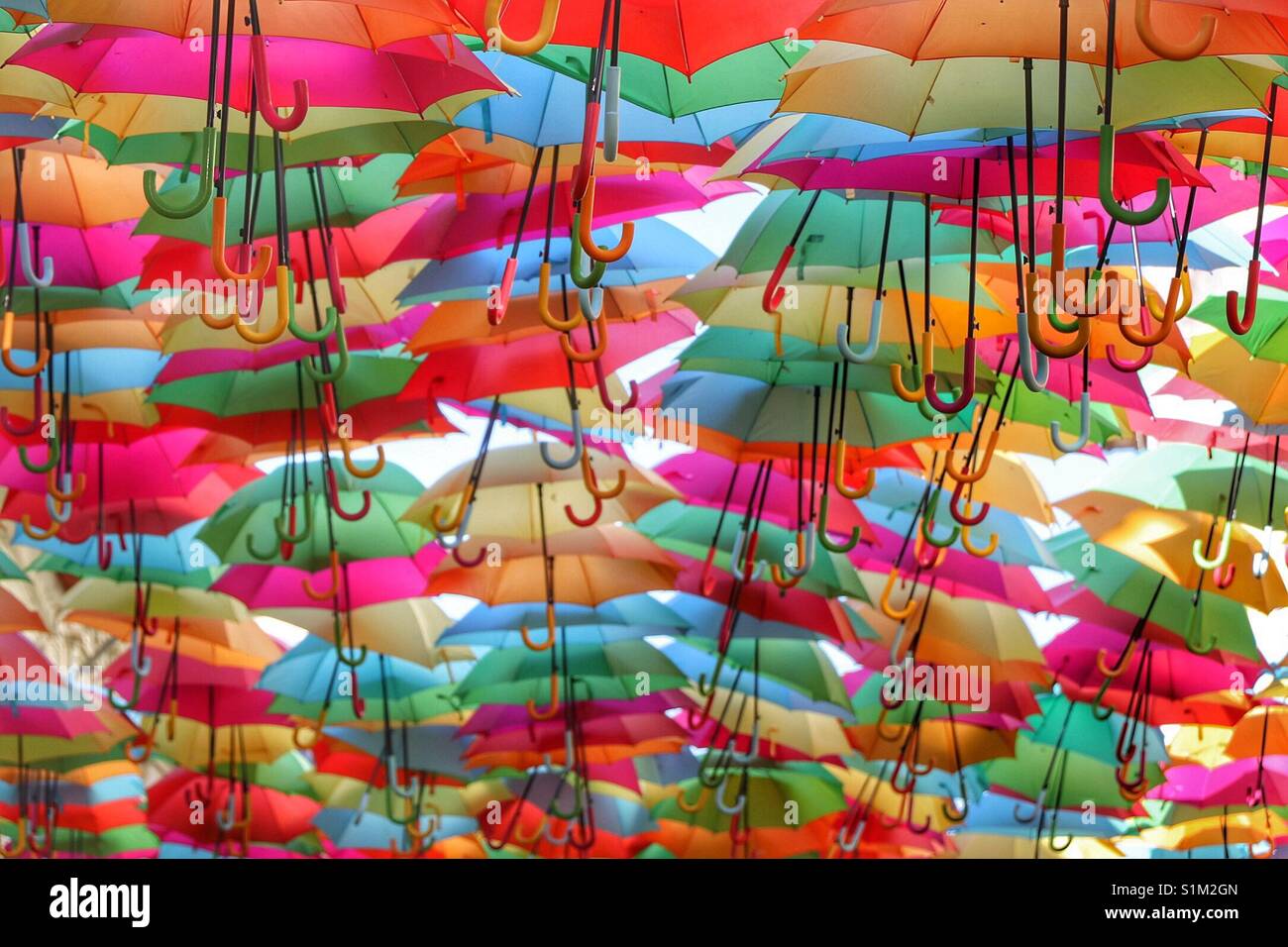 Color umbrellas hanging together - Smartphone Captured Stock Image