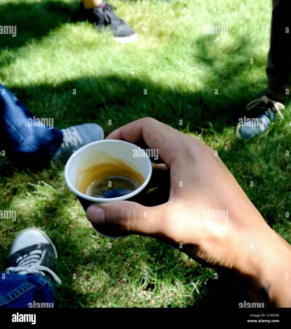 Picture of Hand holding espresso coffee Stock Photo - Alamy