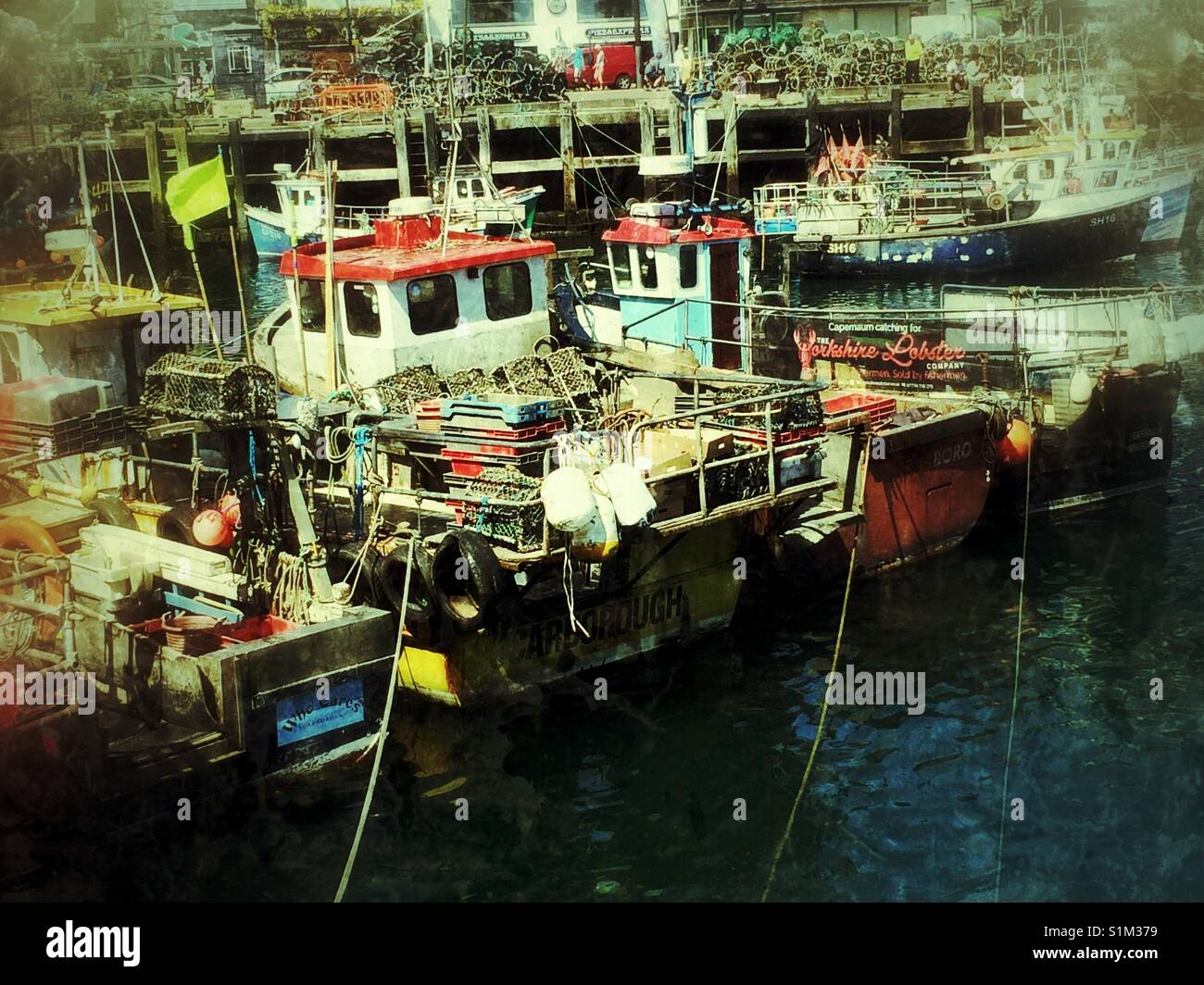 Fishing boats in the harbour Scarborough North Yorkshire England UK - Smartphone Captured Stock Image
